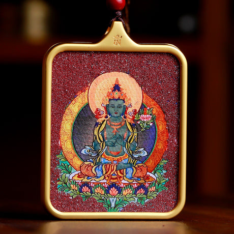 Handgefertigter tibetischer Thangka-Anhänger mit Zinnober – dein persönlicher Schutzbuddha.