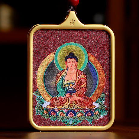 Handgefertigter tibetischer Thangka-Anhänger mit Zinnober – dein persönlicher Schutzbuddha.